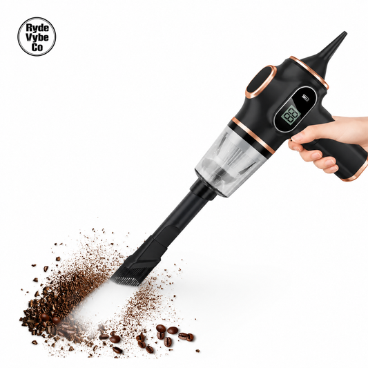 Handheld vacuum cleaner cleaning coffee beans with RydeVybe Co logo.