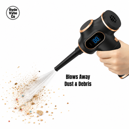 Handheld vacuum cleaner blowing away dust and debris with 'RydeVybe Co' branding.