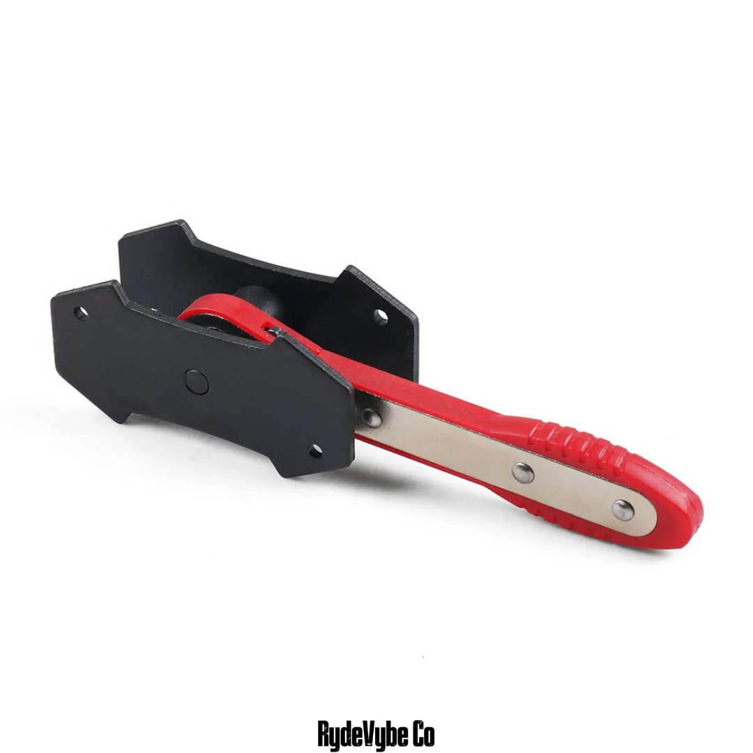 Black and red tool with a white handle on a white background, featuring the RydeVybe Co brand.